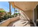 Balcony with tiled flooring and tropical views, perfect for enjoying the outdoors at 11 San Marco St # 307, Clearwater Beach, FL 33767