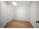 Bedroom with light wood floors, a ceiling fan, crown molding and closet at 11 San Marco St # 307, Clearwater Beach, FL 33767