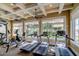 Well-equipped gym with treadmills, elliptical, and stationary bikes, illuminated by natural light at 11 San Marco St # 307, Clearwater Beach, FL 33767