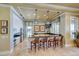 Stylish kitchen with modern appliances, granite countertops, and bar seating at 11 San Marco St # 307, Clearwater Beach, FL 33767