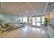 Inviting lobby with comfortable seating, tasteful decor, and access to exterior at 11 San Marco St # 307, Clearwater Beach, FL 33767