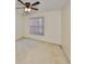 Bedroom with a window and fan on ceiling at 1171 Corinth Greens Dr, Sun City Center, FL 33573