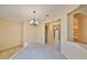 Dining room showcases seamless flow into the adjacent kitchen with tile flooring at 1171 Corinth Greens Dr, Sun City Center, FL 33573