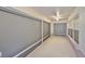 Enclosed lanai with privacy screens and a ceiling fan for added comfort at 1171 Corinth Greens Dr, Sun City Center, FL 33573