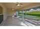 Spacious screened lanai offering views of the landscaped backyard at 1171 Corinth Greens Dr, Sun City Center, FL 33573