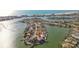 Coastal real estate surrounded by sparkling waterways and cityscapes at 13 Bellevue Dr, Treasure Island, FL 33706