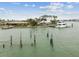 Waterfront home with a private dock and boat, offering serene coastal living at 13 Bellevue Dr, Treasure Island, FL 33706