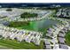 Expansive aerial view of a well-planned community with multiple ponds and green spaces enhancing the landscape at 1409 Tropical Oasis Ave, Plant City, FL 33565