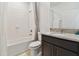 Clean bathroom with a shower and granite vanity at 1409 Tropical Oasis Ave, Plant City, FL 33565