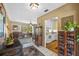 Open floor plan living room and kitchen with view to backyard at 17119 Rainbow Ter, Odessa, FL 33556