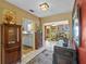 Open floor plan with a view of the sunroom and kitchen at 17119 Rainbow Ter, Odessa, FL 33556
