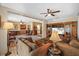 Spacious living room offers multiple sitting areas and seamlessly connects to other rooms of the home at 17119 Rainbow Ter, Odessa, FL 33556