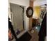 Bathroom featuring walk-in shower, tile floors, decorative mirror, and vanity with sink at 17233 Dalberg Dr, Spring Hill, FL 34610