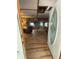 An open entryway shows the living room, kitchen, and open concept layout at 17233 Dalberg Dr, Spring Hill, FL 34610