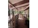 Spacious porch with seating, wooden deck, decorated with outdoor accents at 17233 Dalberg Dr, Spring Hill, FL 34610