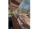 Exterior view from porch overlooking trees and foliage, with car in distance at 17233 Dalberg Dr, Spring Hill, FL 34610
