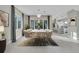 Bright dining room featuring modern decor with a neutral color palette and large windows at 1956 Cedar Dr, Dunedin, FL 34698