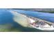 Aerial view of waterfront restaurant with beach access and a scenic view of the ocean at 2506 N Rocky Point Dr # 242, Tampa, FL 33607