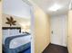 Cozy bedroom with a large bed, and decor at 2506 N Rocky Point Dr # 242, Tampa, FL 33607