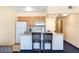 Functional kitchen with modern appliances and breakfast bar seating at 2506 N Rocky Point Dr # 242, Tampa, FL 33607