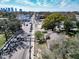 Aerial view shows home near a road with cityscape in the distance at 2606 N Boulevard, Tampa, FL 33602