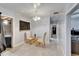 Cozy dining area featuring neutral walls, unique flooring, and a glass table setting at 2606 N Boulevard, Tampa, FL 33602