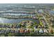 Beautiful aerial view of the homes bordering a large, winding waterway at 2769 Harvest Drive, Sarasota, FL 34240