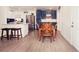 Inviting dining area next to a well-equipped kitchen, perfect for Gathering meals and entertaining at 302 N Lauber Way, Tampa, FL 33609