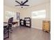 Office space with neutral walls and a modern ceiling fan at 302 N Lauber Way, Tampa, FL 33609