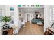An open layout, wood-look floors, modern decor, and sunlit ambiance at 3765 21St S Ave, St Petersburg, FL 33711