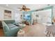 Bright living area with wood-look floors, an open layout, and tasteful decor at 3765 21St S Ave, St Petersburg, FL 33711