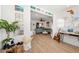 Features an open floor plan, modern furnishings, and wood-look flooring at 3765 21St S Ave, St Petersburg, FL 33711