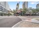 Street-level shot of a city street and building with storefronts and traffic signals at 3765 21St S Ave, St Petersburg, FL 33711