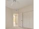 Bedroom with a ceiling fan, closet space and a view to the doorway at 4216 Preserve Pl, Palm Harbor, FL 34685