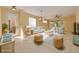 Bright, staged living room with a comfortable seating arrangement and stylish decor at 4216 Preserve Pl, Palm Harbor, FL 34685