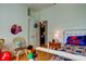 Bright bedroom with hardwood floors and a bed decorated with a Spiderman theme at 510 Pine S Ave, Oldsmar, FL 34677