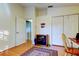Bright office features hardwood floors, a storage cabinet, and dual closets at 510 Pine S Ave, Oldsmar, FL 34677