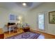 Home office featuring a wooden desk, hardwood floors, and a ceiling fan at 510 Pine S Ave, Oldsmar, FL 34677