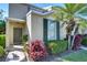 Charming home featuring an attractive front door, lush landscaping, and inviting curb appeal at 6255 Osprey Lake Cir, Riverview, FL 33578