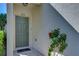 Welcoming front door with attractive tile work and clean, modern architecture at 6255 Osprey Lake Cir, Riverview, FL 33578