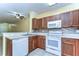Lovely kitchen with stainless steel appliances and a tile backsplash at 6255 Osprey Lake Cir, Riverview, FL 33578