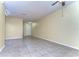 Expansive living area with tile flooring and neutral walls, filled with natural light, creates an open and inviting ambiance at 6255 Osprey Lake Cir, Riverview, FL 33578