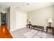 Bright bedroom featuring a ceiling fan and a closet, plus two accent tables for decor at 6863 Hanworth Ln, Zephyrhills, FL 33541