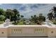 Beautiful garden view of the grounds and gazebo from the terrace at 820 Druid S Rd, Clearwater, FL 33756