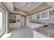 Modern kitchen with stainless steel appliances, granite countertops, and ample cabinet space at 820 Druid S Rd, Clearwater, FL 33756