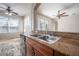 Functional kitchen sink with granite counter and stainless steel dual basin at 9224 Lost Mill Dr, Land O Lakes, FL 34638