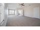 Spacious main bedroom with an open floor plan and access to the main bathroom at 9224 Lost Mill Dr, Land O Lakes, FL 34638