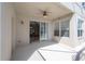 Bright and airy patio area with view of the interior and natural lighting at 9224 Lost Mill Dr, Land O Lakes, FL 34638