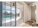 Covered patio offers a view of the pool and outdoor area at 9224 Lost Mill Dr, Land O Lakes, FL 34638