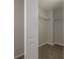 Walk-in closet with shelving for optimal storage at 9224 Lost Mill Dr, Land O Lakes, FL 34638